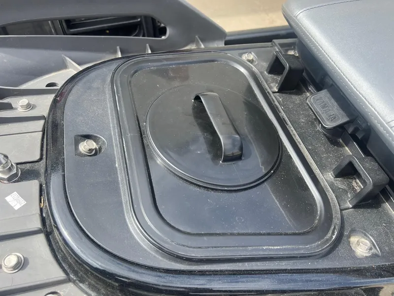 Slide: The Image of 2017 Yamaha WaveRunner VX Deluxe storage compartment with handle, black finish. - 12