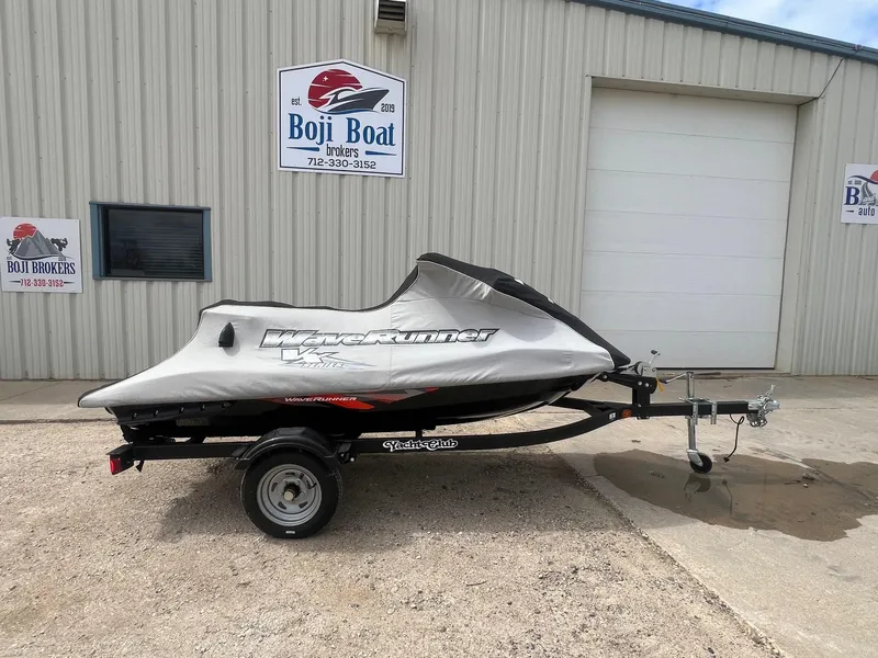 Slide: The Image of 2017 Yamaha WaveRunner VX Deluxe covered on trailer outside Boji Boat building. - 16