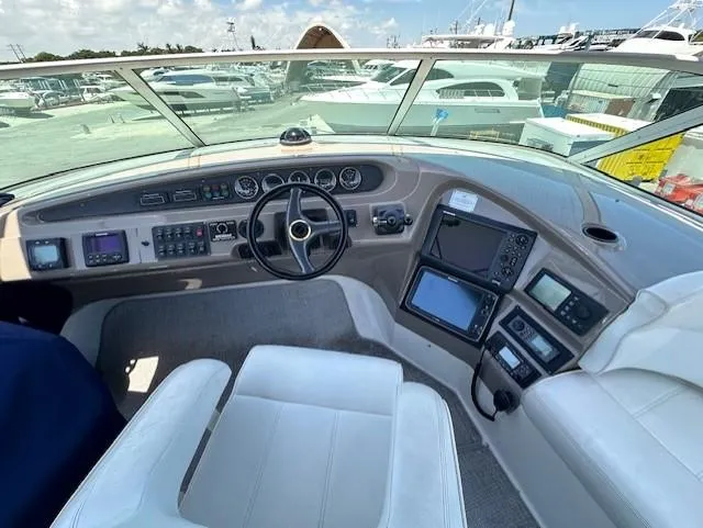 Slide: The Image of Interior view of Carver 450 Voyager Pilothouse 2000 helm station. - 10