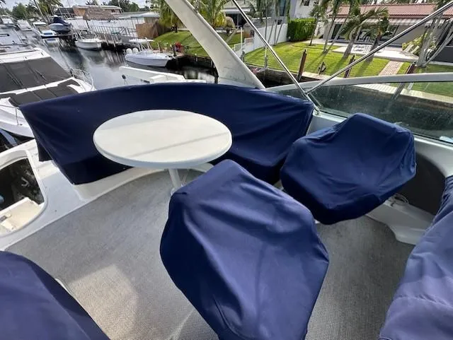 Slide: The Image of Carver 450 Voyager Pilothouse 2000 with covered seating area. - 19