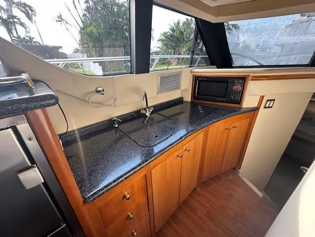 Slide: The Image of Galley area of 2000 Carver 450 Voyager Pilothouse. - 25
