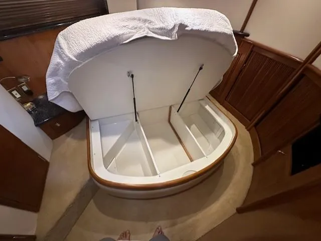 Slide: The Image of Interior of 2000 Carver 450 Voyager Pilothouse with storage space. - 39