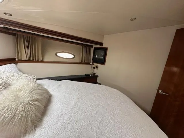 Slide: The Image of Interior of 2000 Carver 450 Voyager Pilothouse with cozy bedroom. - 46