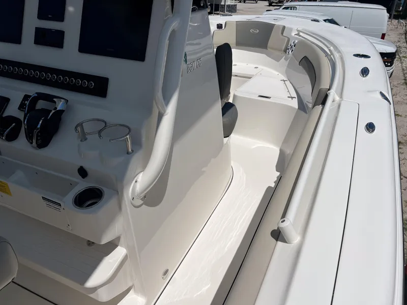 Slide: The Image of 2025 Key West 260 Center Console boat interior with modern dashboard and seating. - 27