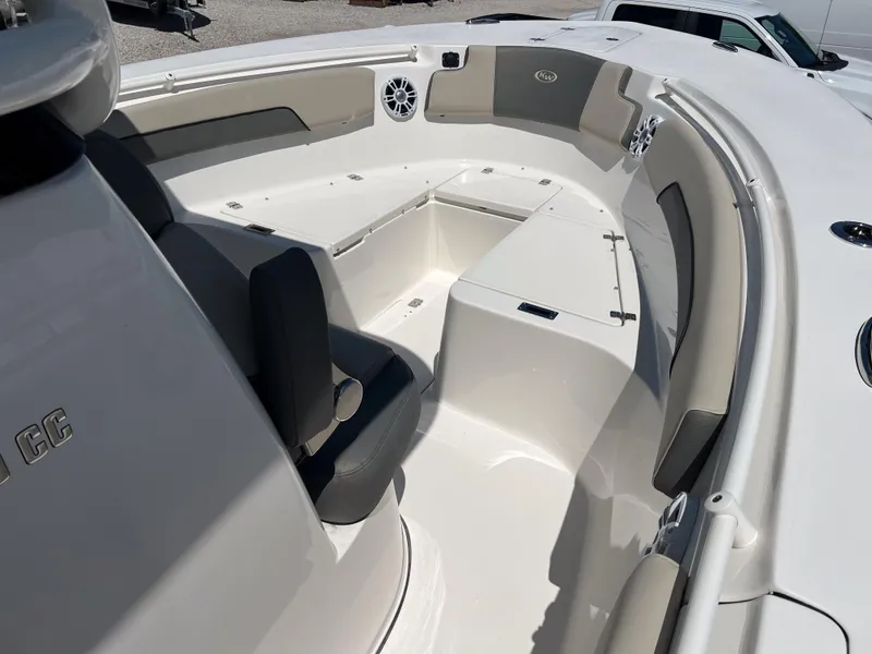 Slide: The Image of 2025 Key West 260 Center Console boat interior with seating and storage compartments. - 28