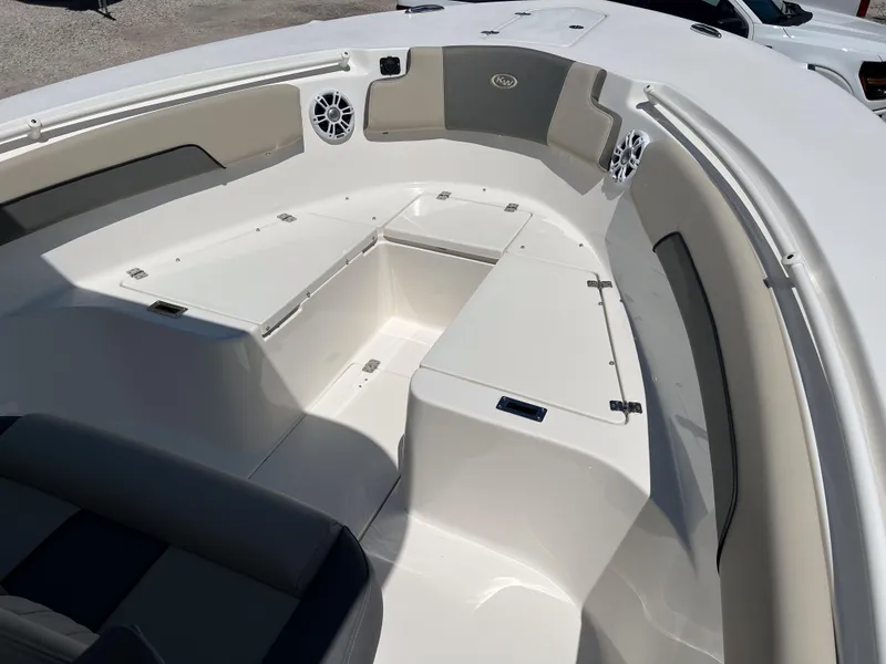 Slide: The Image of 2025 Key West 260 Center Console boat interior with seating and storage compartments. - 29