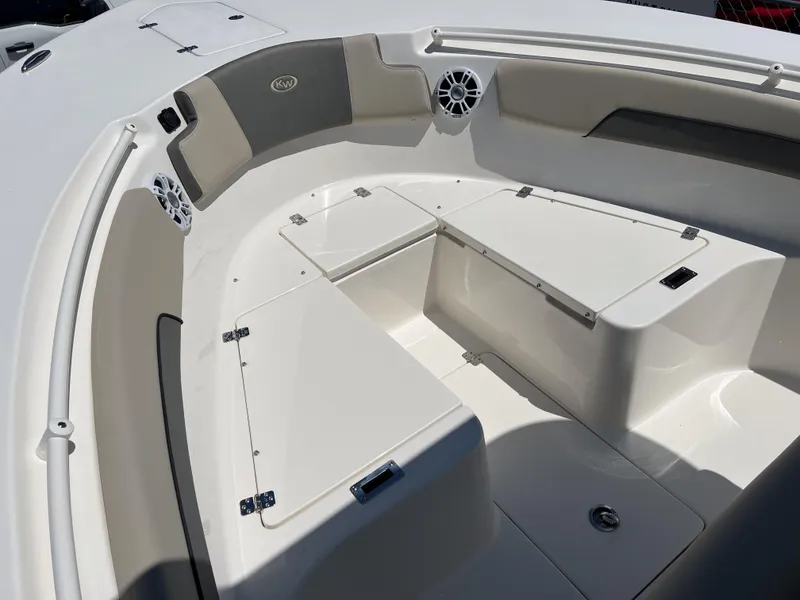 Slide: The Image of 2025 Key West 260 Center Console boat interior with seating and storage compartments. - 31