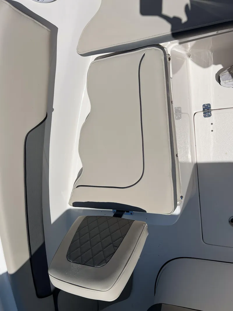 Slide: The Image of 2025 Key West 260 Center Console boat interior seating, featuring sleek design and comfortable upholstery. - 35