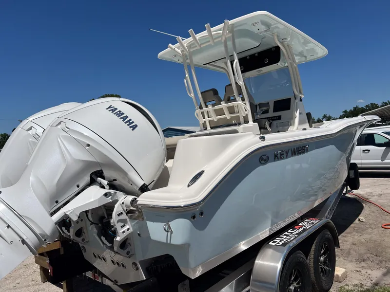 Slide: The Image of 2025 Key West 260 Center Console boat with Yamaha engine on trailer. - 5