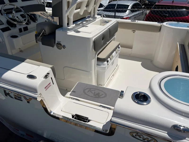 Slide: The Image of 2025 Key West 260 Center Console boat interior with seating and control panel. - 9