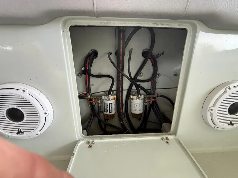 Slide: The Image of Interior wiring of a 2004 Boston Whaler Guardian 27 boat with speakers visible. - 23