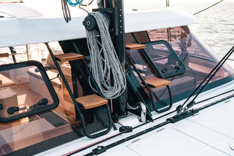 Slide: The Image of 2025 Nautitech 40 Open yacht deck with ropes and wooden steps. - 16