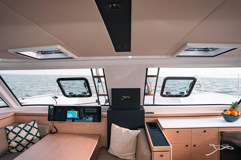 Slide: The Image of 2025 Nautitech 40 Open yacht interior with modern navigation system and ocean view. - 30