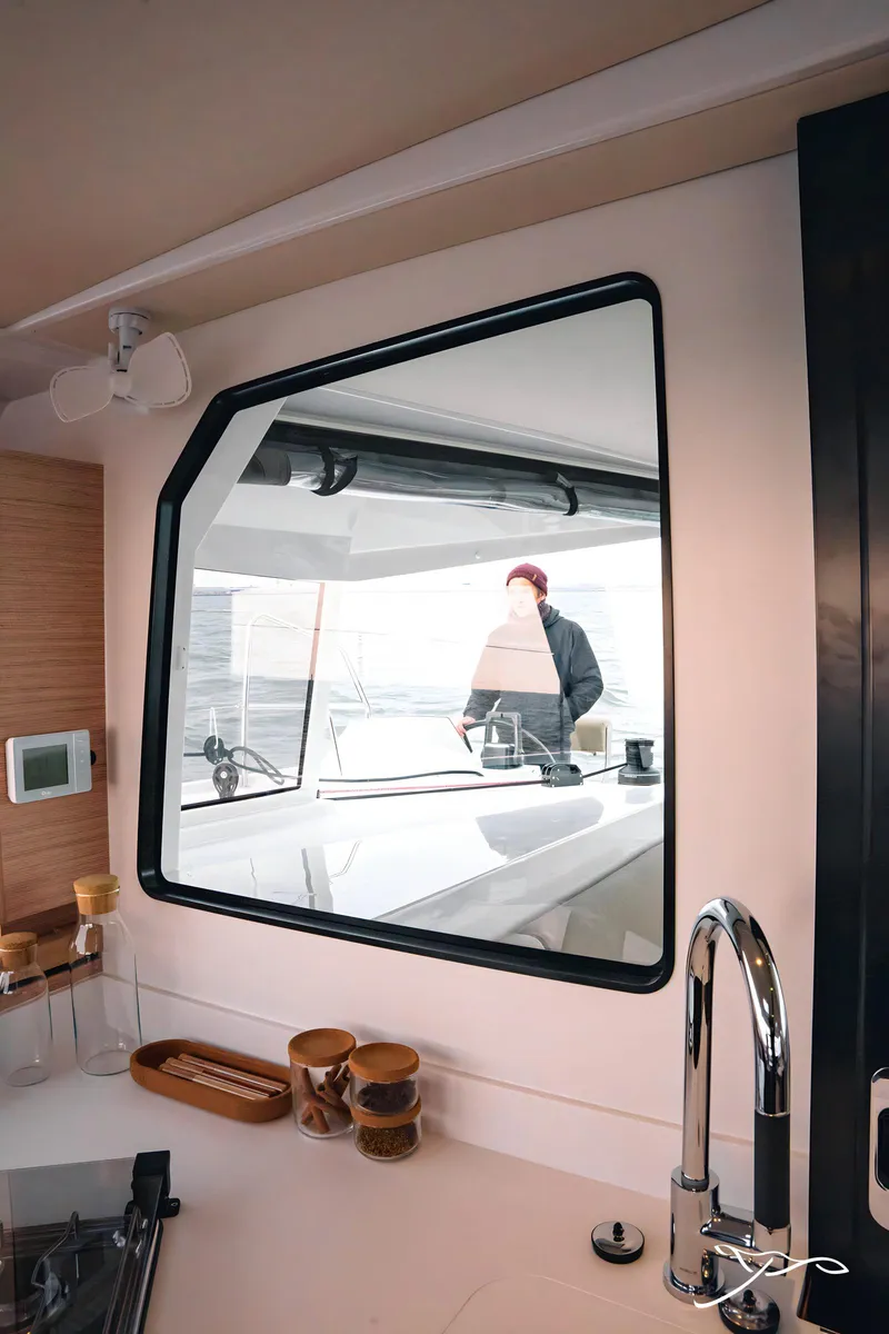 Slide: The Image of 2025 Nautitech 40 Open yacht interior with modern kitchen and window view. - 41