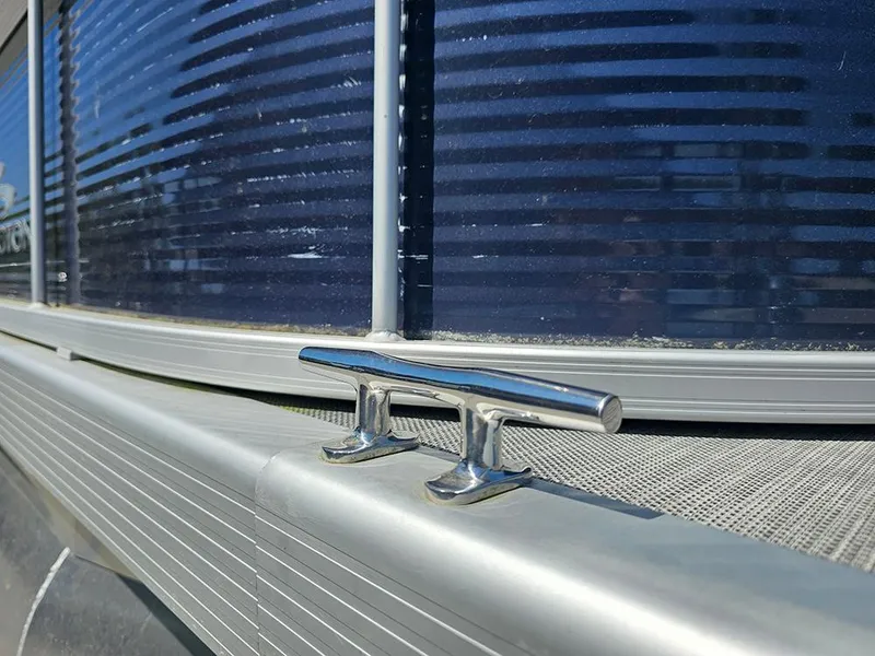 Slide: The Image of Close-up of a 2021 Bennington 20 SSR boat cleat and railing. - 21