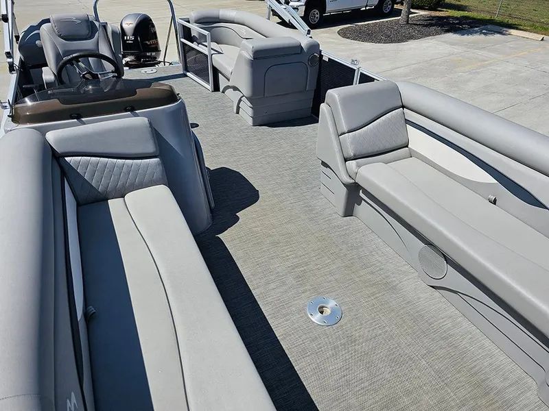Slide: The Image of 2021 Bennington 20 SSR pontoon boat interior with spacious seating and modern design. - 9