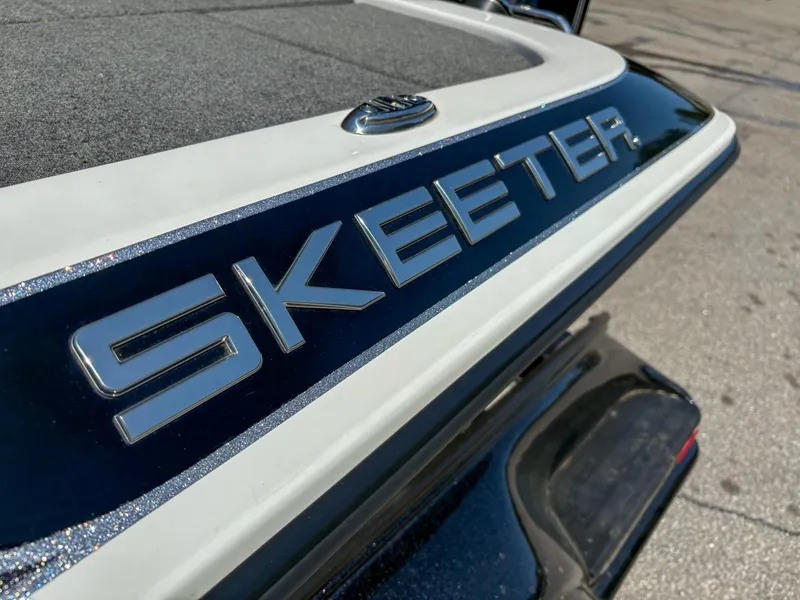 Slide: The Image of 2014 Skeeter FX 21 boat, close-up of logo on sleek exterior. - 3