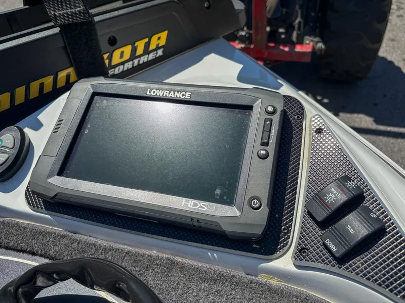 Slide: The Image of Lowrance HDS fishfinder on 2014 Skeeter FX 21 boat dashboard, with Minn Kota Fortrex trolling motor. - 8