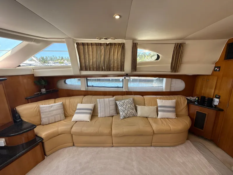 Slide: The Image of Luxurious interior of 2001 Carver 396 Motor Yacht with plush seating and elegant decor. - 18
