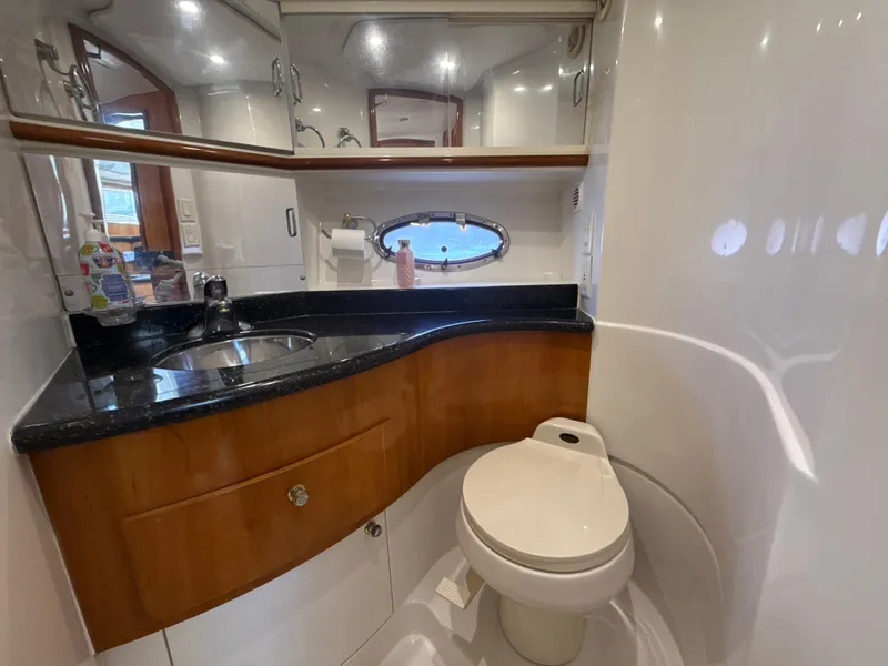 Slide: The Image of Luxurious bathroom in 2001 Carver 396 Motor Yacht with modern fixtures and elegant design. - 21