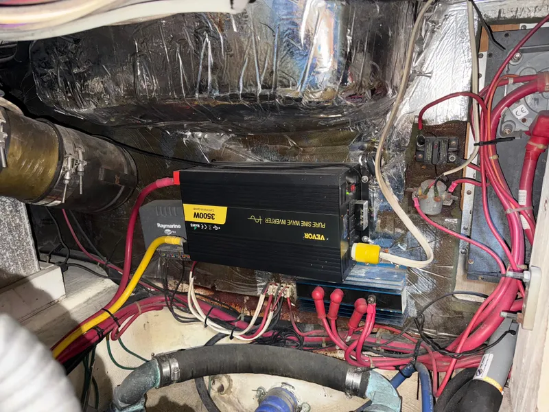 Slide: The Image of Engine room of 2001 Carver 396 Motor Yacht with inverter and wiring. - 25