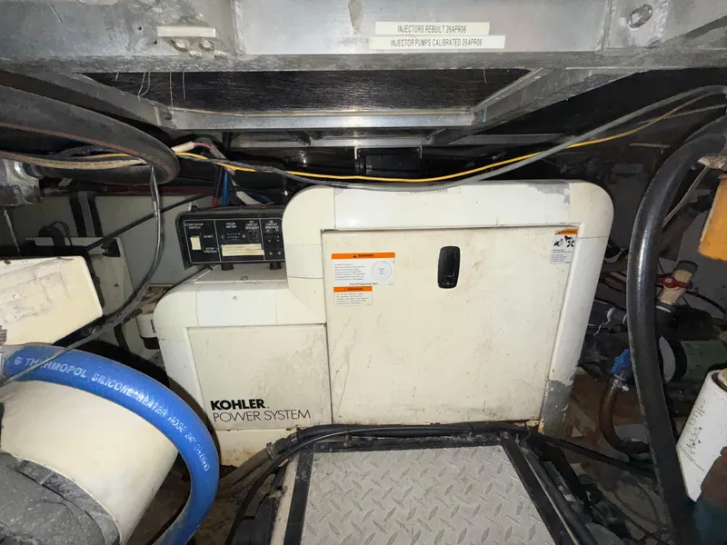 Slide: The Image of Engine room of 2001 Carver 396 Motor Yacht with Kohler power system. - 27