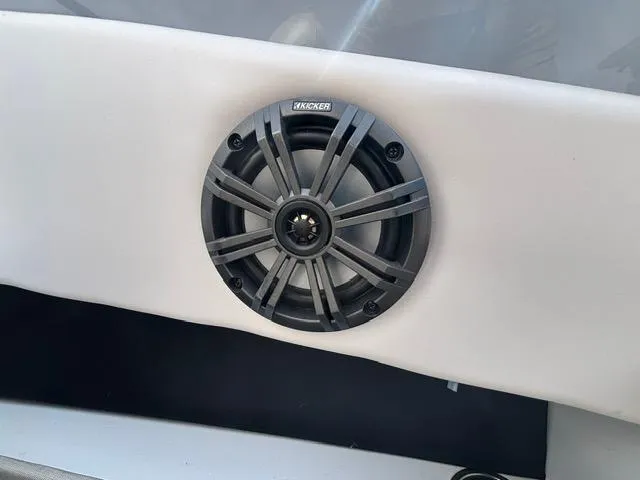 Slide: The Image of Speaker installed on a 2021 Glastron GTS 185 boat interior. - 33