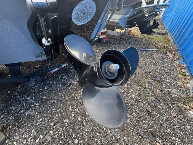 Slide: The Image of Propeller of 2021 Glastron GTS 185 boat on gravel surface. - 38