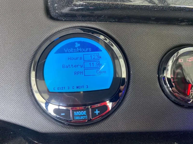 Slide: The Image of Digital display on 2018 Crest Caliber 250 SLRC showing hours, battery, and RPM. - 18