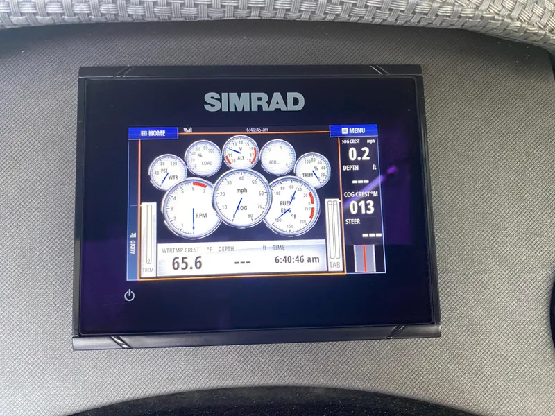 Slide: The Image of Simrad display on 2018 Crest Caliber 250 SLRC showing speed, depth, and navigation data. - 19