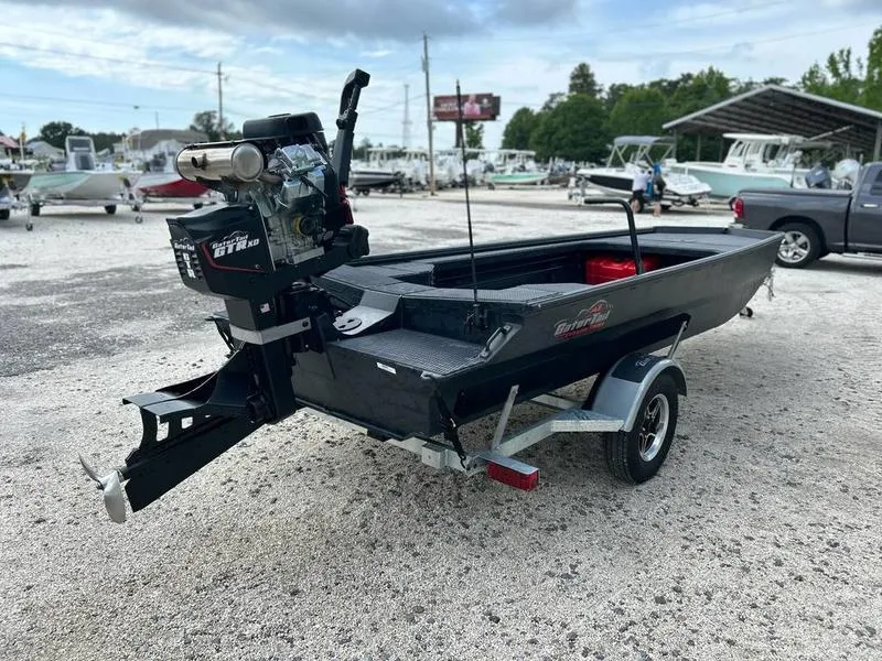 Slide: The Image of 2025 Gator Tail EXTREME MOD V 1854 boat on trailer in outdoor setting. - 3