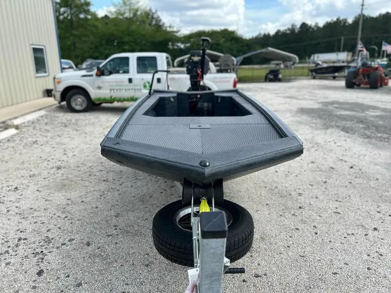 Slide: The Image of 2025 Gator Tail EXTREME MOD V 1854 boat on trailer in outdoor setting. - 4