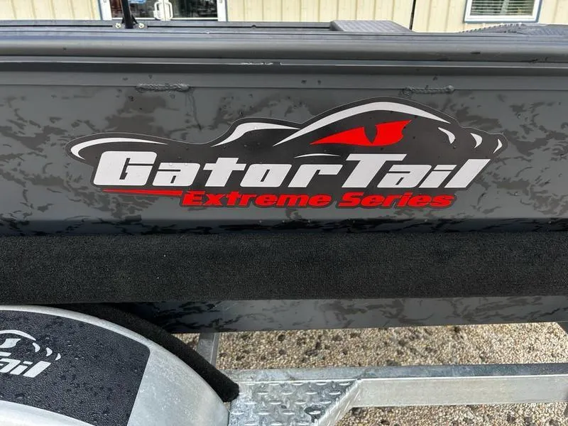 Slide: The Image of Gator Tail Extreme Series logo on 2025 EXTREME MOD V 1854 boat exterior. - 7