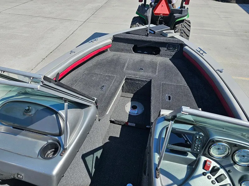 Slide: The Image of 2009 Lowe Fish & Ski FS165 boat interior with dashboard and seating area. - 15