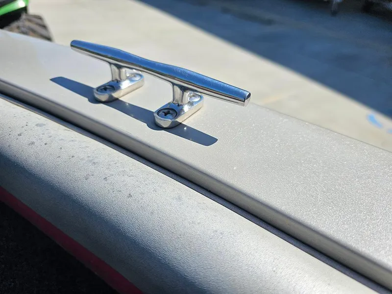 Slide: The Image of 2009 Lowe Fish & Ski FS165 boat cleat in sunlight, showcasing sleek design and durability. - 17