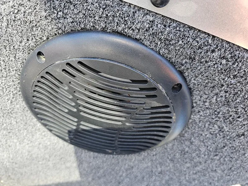 Slide: The Image of Speaker grille on 2009 Lowe Fish & Ski FS165 boat interior. - 19