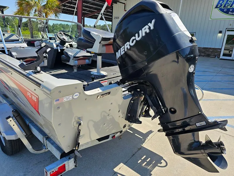 Slide: The Image of 2009 Lowe Fish & Ski FS165 boat with Mercury outboard motor on trailer. - 8