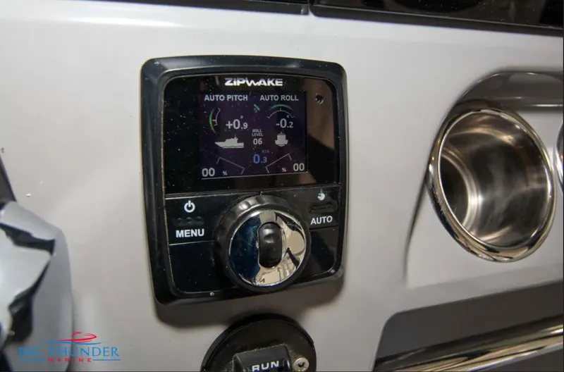 Slide: The Image of Control panel of a 2020 Jeanneau Leader 10.5 boat with Zipwake auto pitch and roll system. - 23