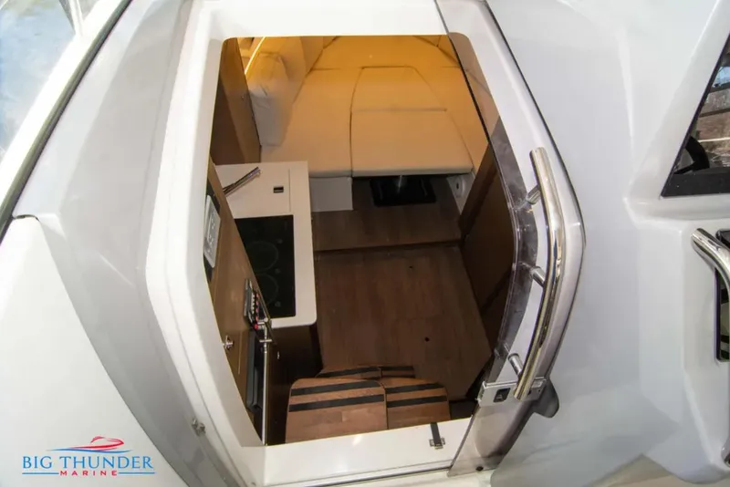 Slide: The Image of Interior view of 2020 Jeanneau Leader 10.5 cabin with modern amenities. - 27