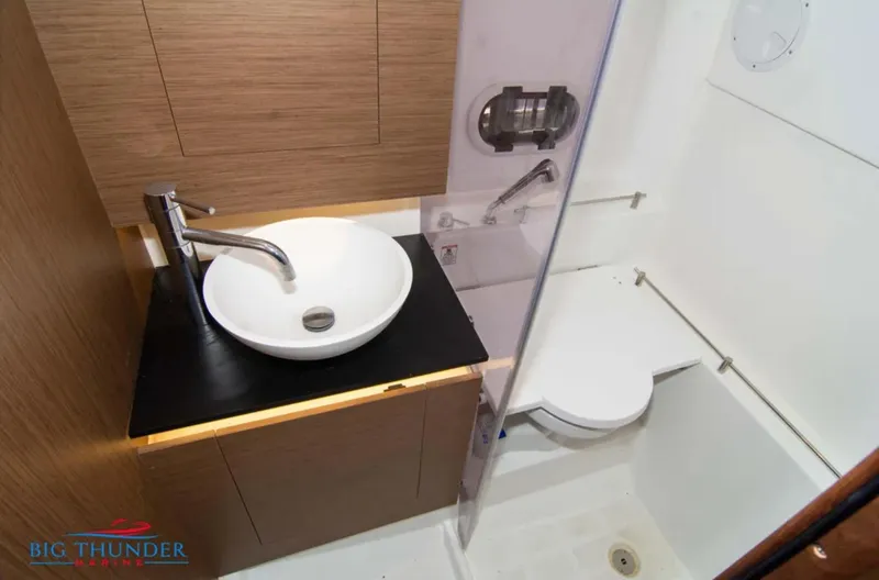 Slide: The Image of Modern bathroom in 2020 Jeanneau Leader 10.5 boat with sink and toilet. - 33