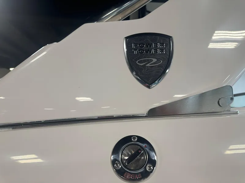 Slide: The Image of 2026 Regal LS9 boat detail with Power Tower emblem and gas cap. - 30