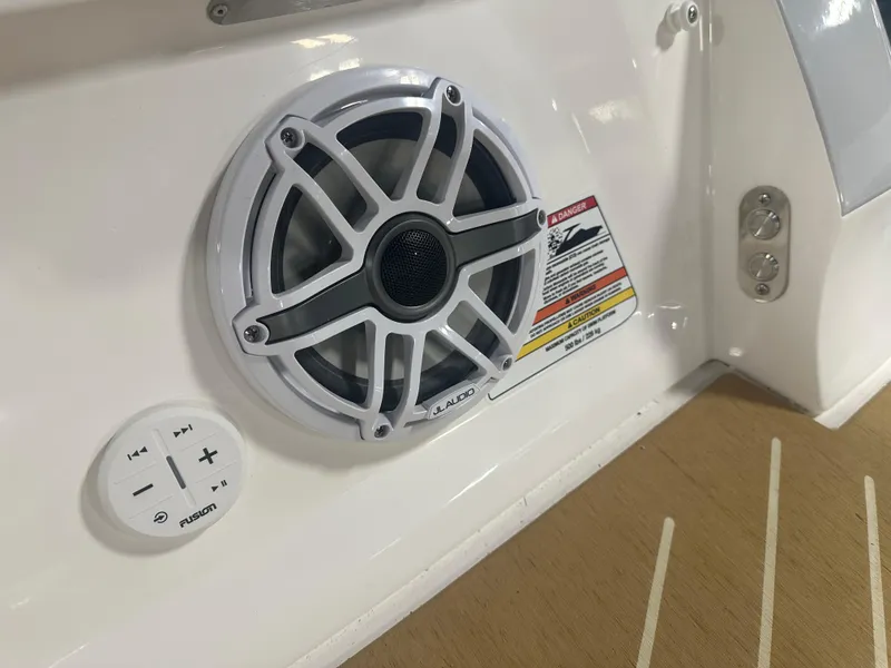 Slide: The Image of 2026 Regal LS9 boat speaker and control panel on deck. - 6