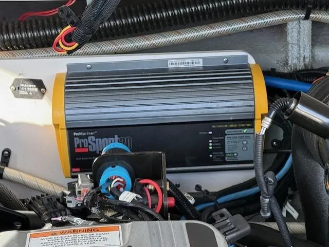 Slide: The Image of Battery charger in a 2016 Crownline 270 SS boat engine compartment. - 18