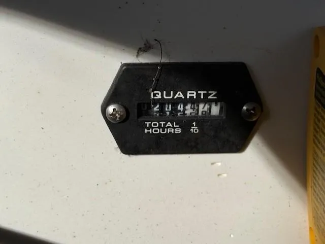 Slide: The Image of Hour meter reading 244.4 on a 2016 Crownline 270 SS boat. - 19