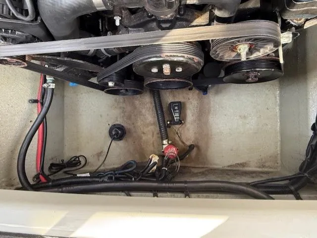 Slide: The Image of Engine compartment of a 2016 Crownline 270 SS boat, showing belts and pulleys. - 20