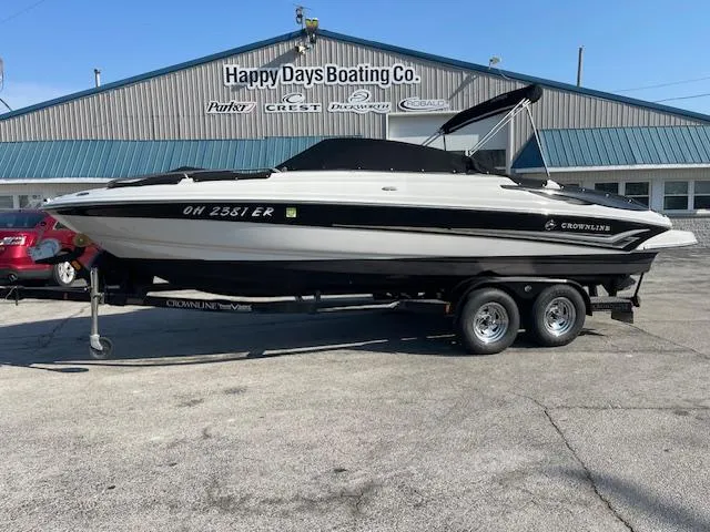 Slide: The Image of 2008 Crownline 230 LS boat on trailer at Happy Days Boating Co. dealership. - 2