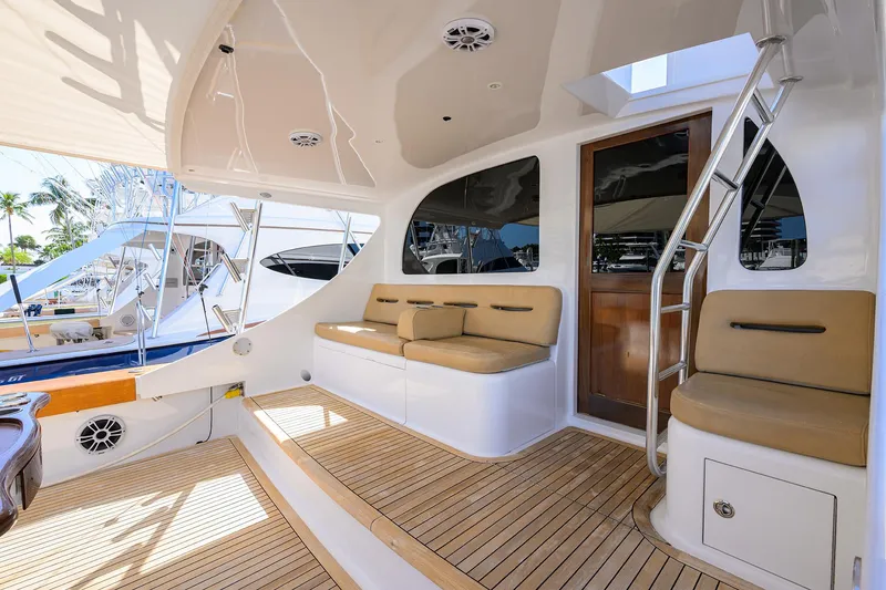 Slide: The Image of Luxurious 2006 Blackwell Custom Carolina yacht interior with cushioned seating and wooden flooring. - 10