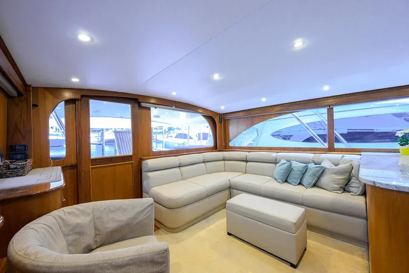 Slide: The Image of Luxurious 2006 Blackwell Custom Carolina yacht interior with plush seating and elegant wood finishes. - 17