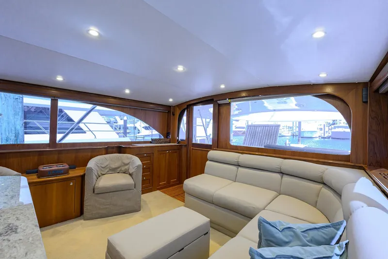 Slide: The Image of Luxurious interior of 2006 Blackwell Custom Carolina yacht with plush seating and wood accents. - 19