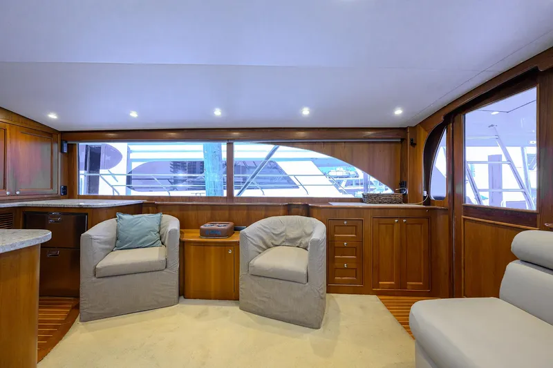 Slide: The Image of Luxurious interior of 2006 Blackwell Custom Carolina yacht with plush seating and wooden cabinetry. - 23